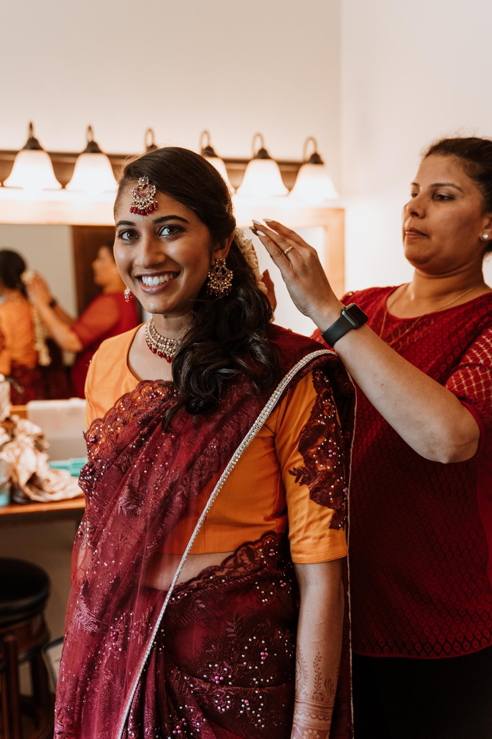 Bride puts the final touches before her Indian wedding at Hornbakers Gardens