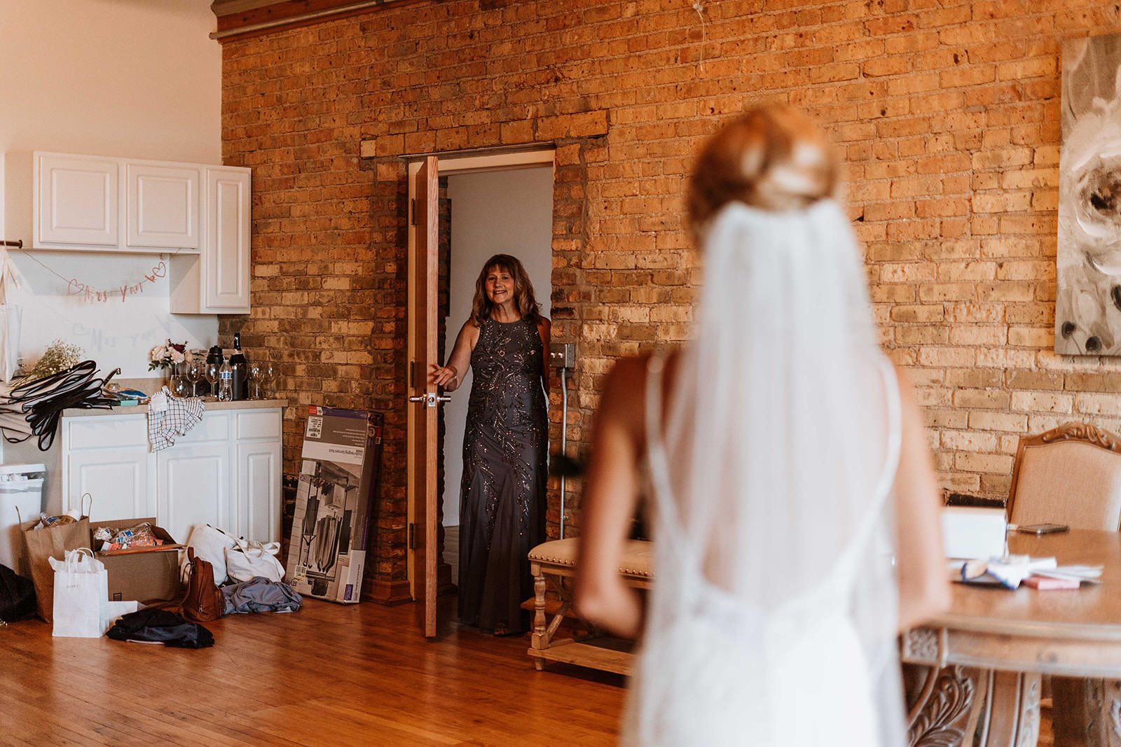 Bride has a first look with her mom on her wedding day