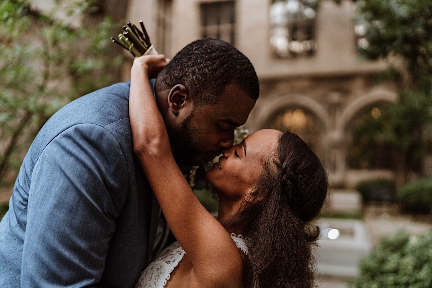 Bride and groom share kiss after University of Chicago elopement