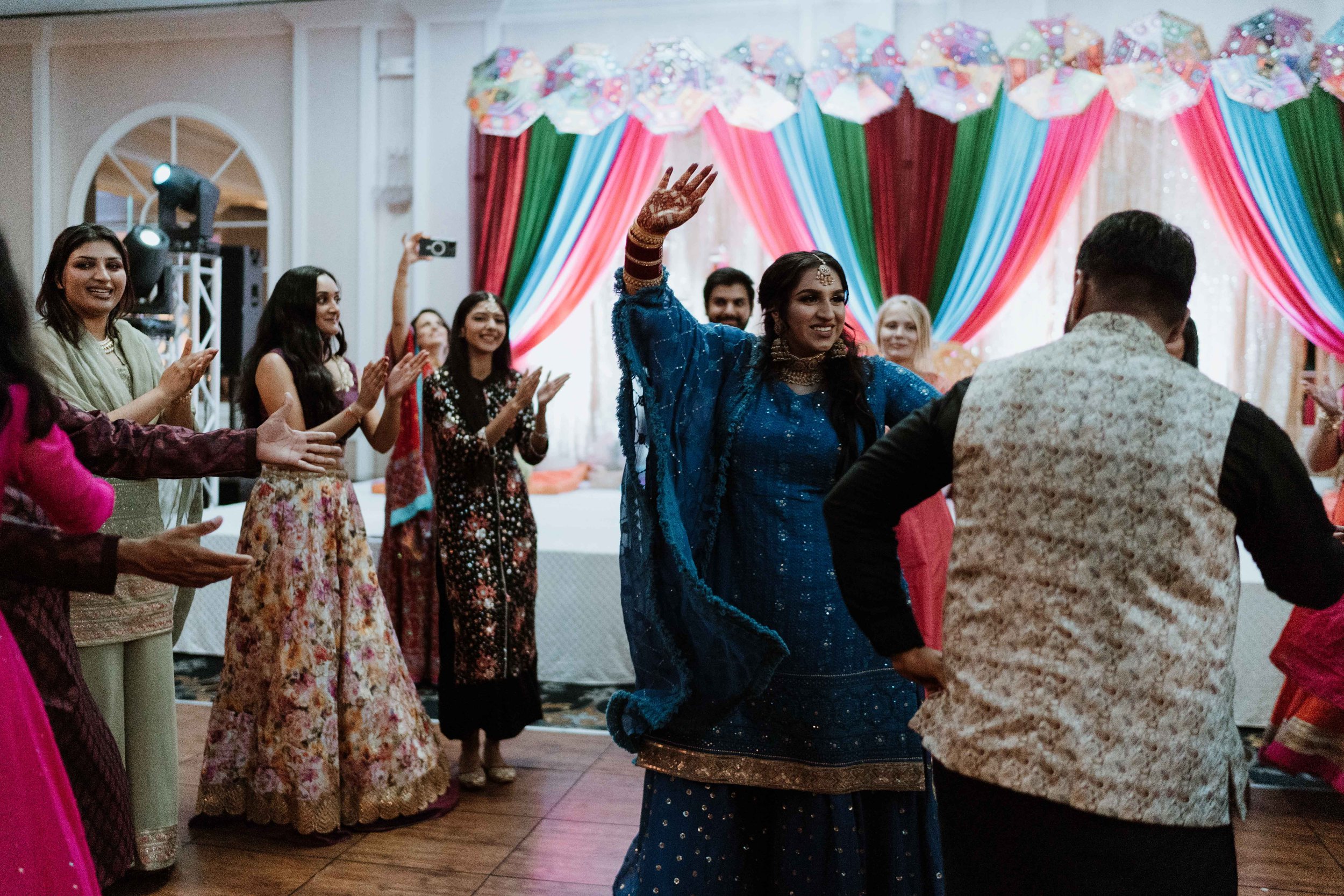 Bride and groom dancing at Jago party during Indian Wedding