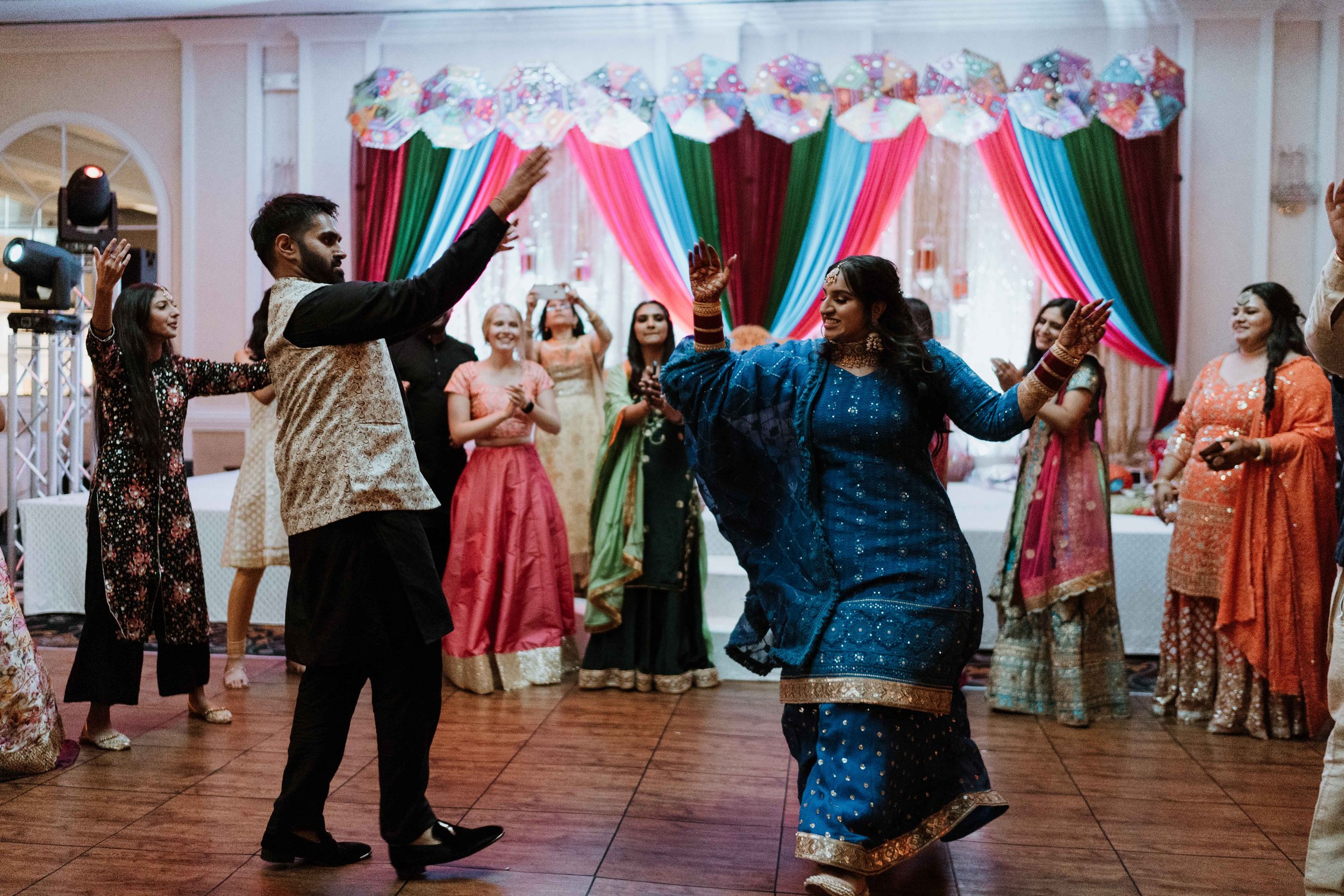 Bride and groom dancing at Jago party during Indian Wedding