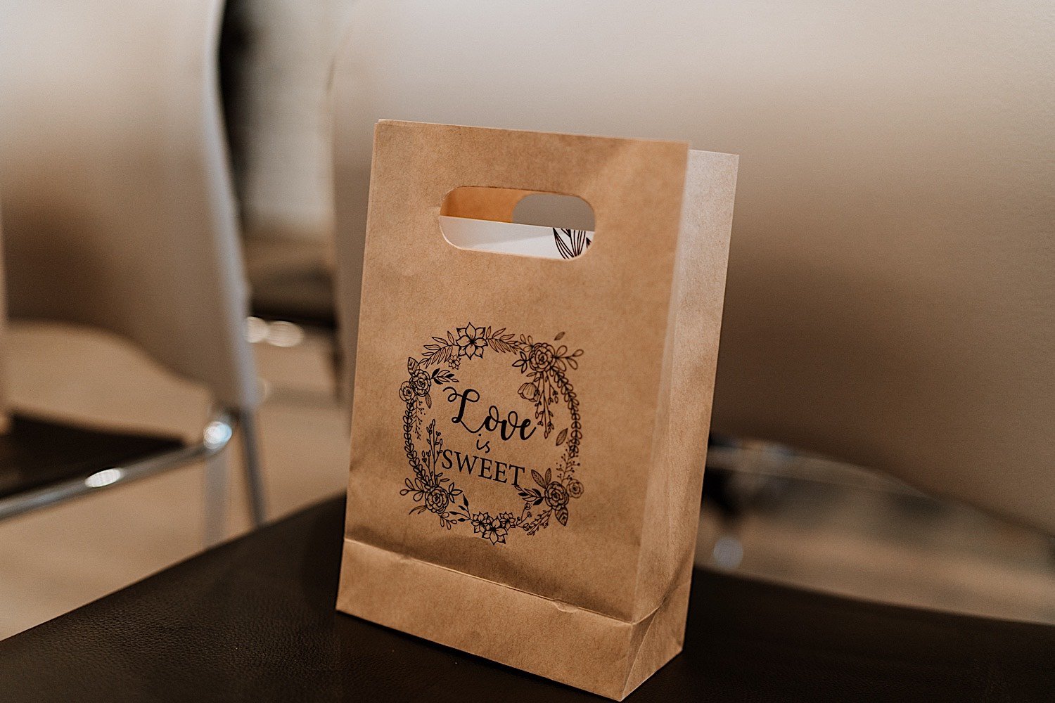 Picture of a wedding gift bag, reads Love is Sweet