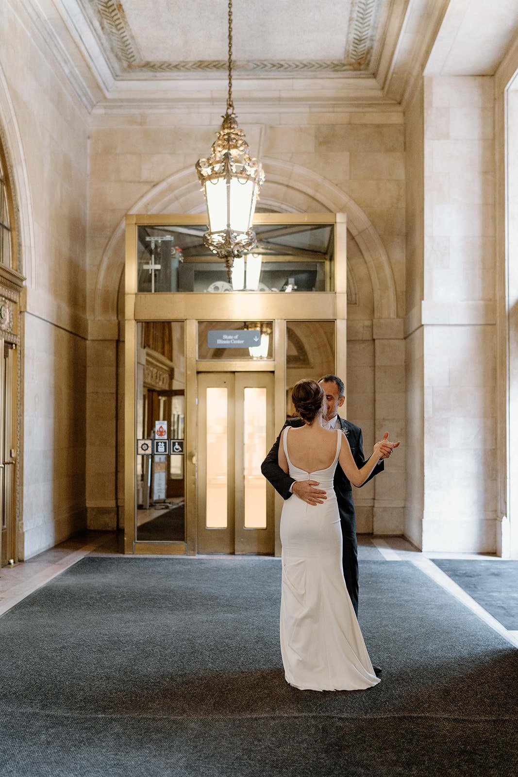 couple shares a first dance after their Chicago courthouse elopement
