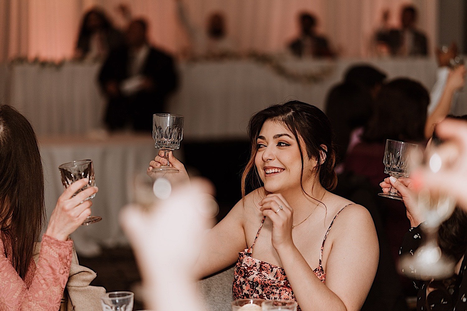 Guests toast the newly weds during Chicagoland ballroom wedding reception