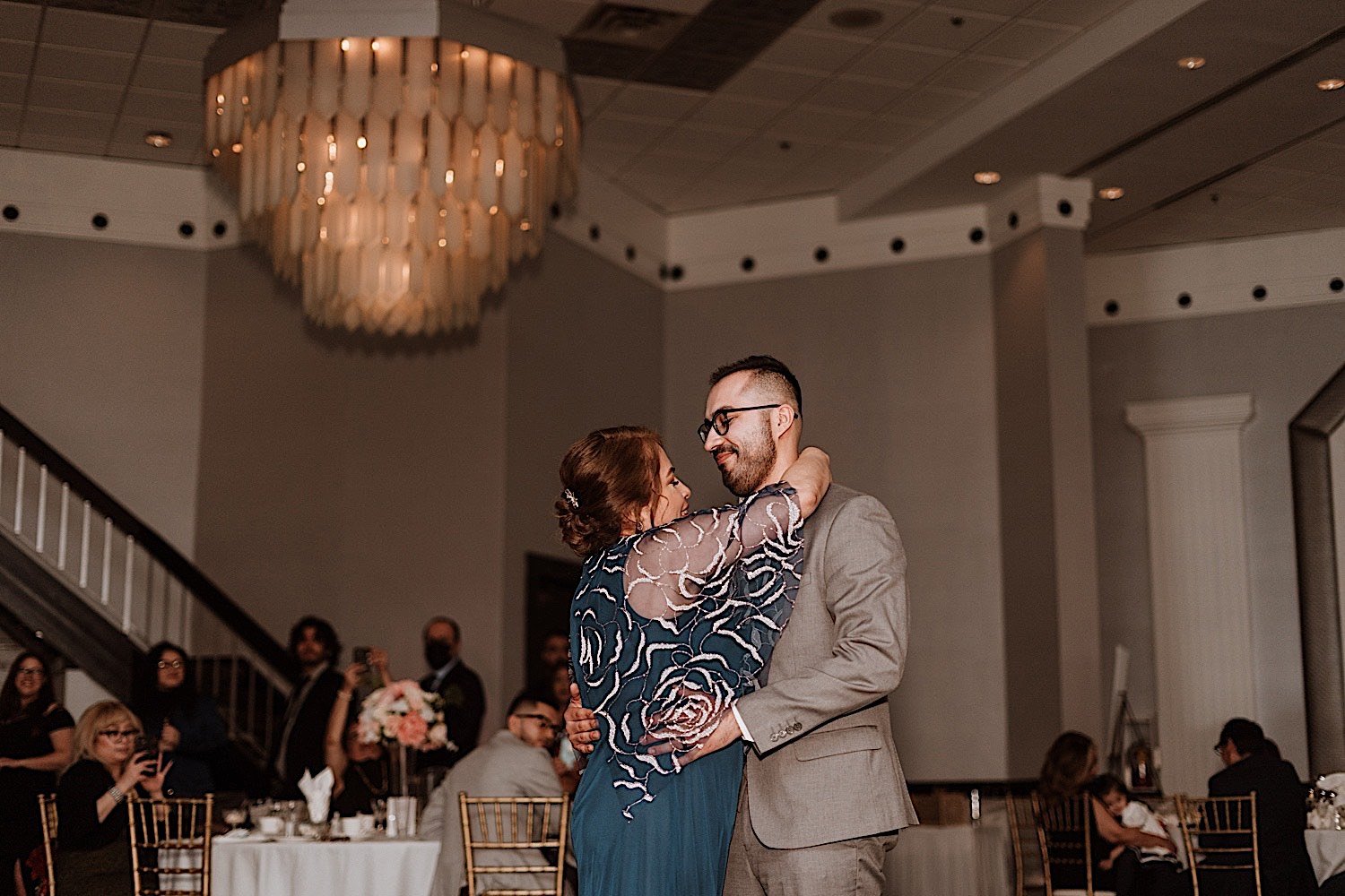 Groom shares dance with his mother during Chicagoland ballroom wedding reception