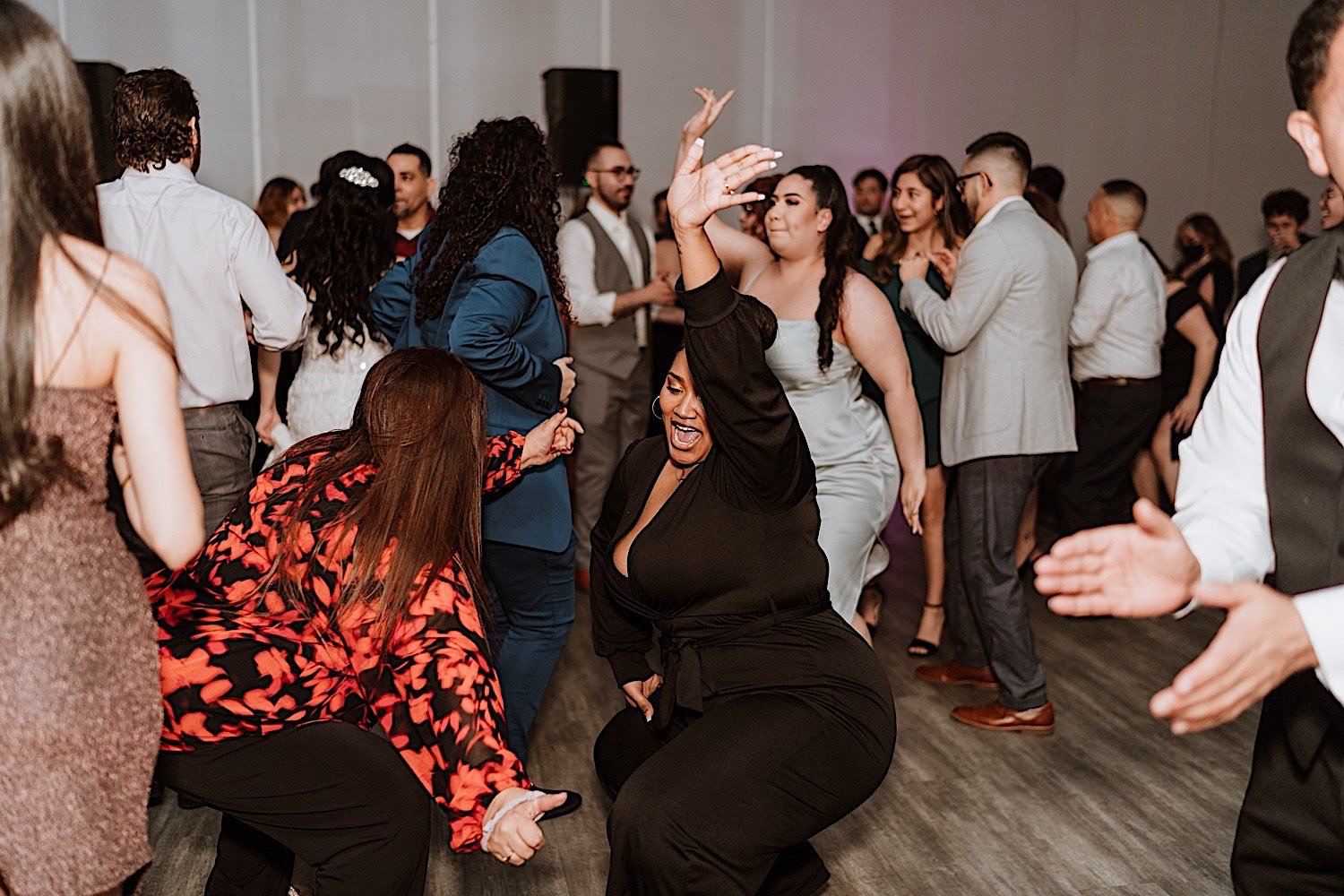 Guests dance during Chicagoland ballroom wedding reception