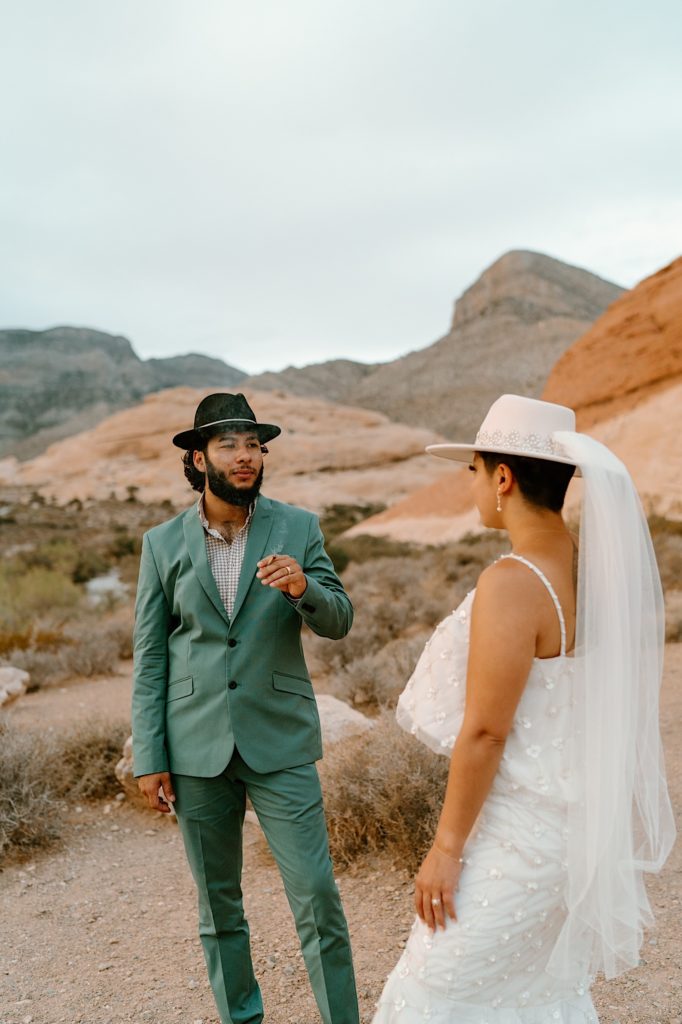 The bride and groom sharing a joint during their Las Vegas Elopement
