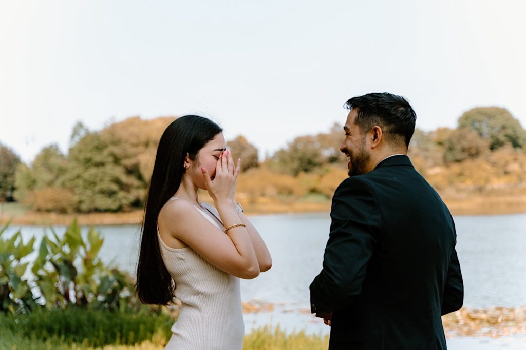 Fiancé's feel their emotions while standing at the Chicago Botanic Gardens. 