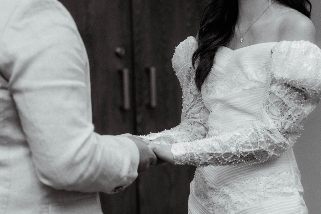 bride and groom holding hands - chicago city hall elopement