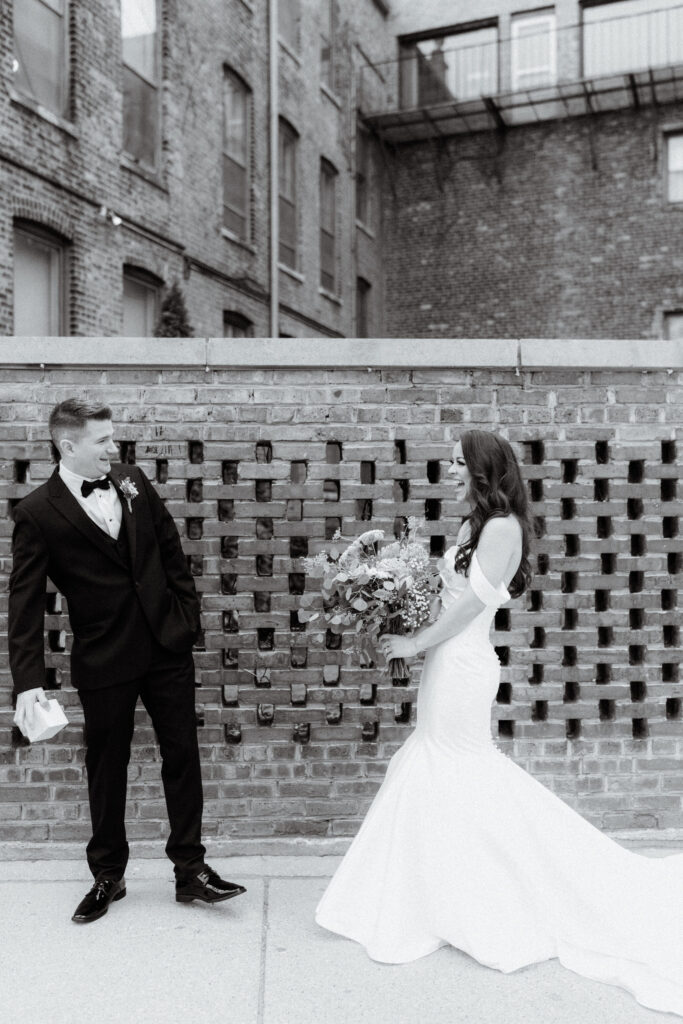 bride and groom's first looks where the groom is in awe of his bride