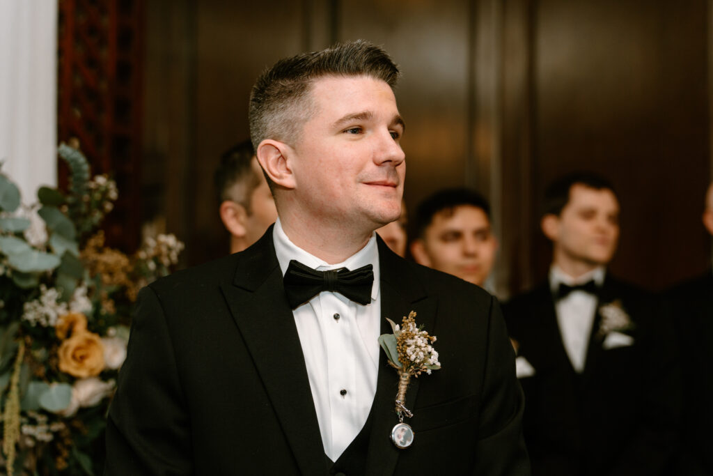 groom looking at a distance